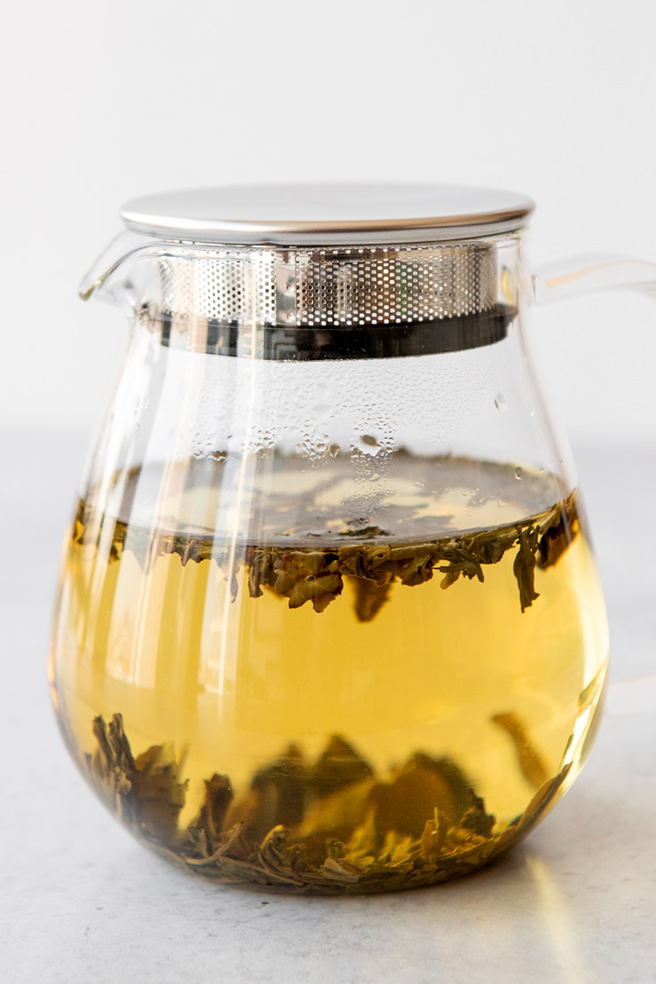 Cold steeping loose tea in a glass teapot.
