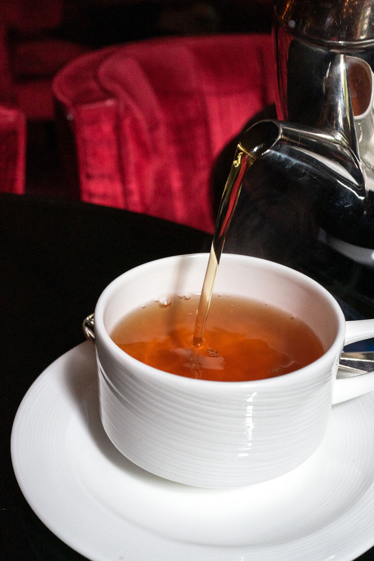 Cup of tea being poured at Four Seasons New York