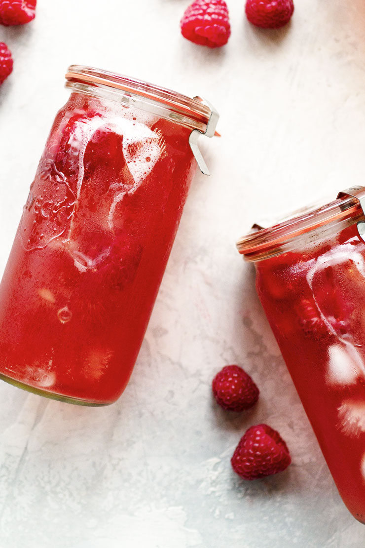 Raspberry iced tea in jars