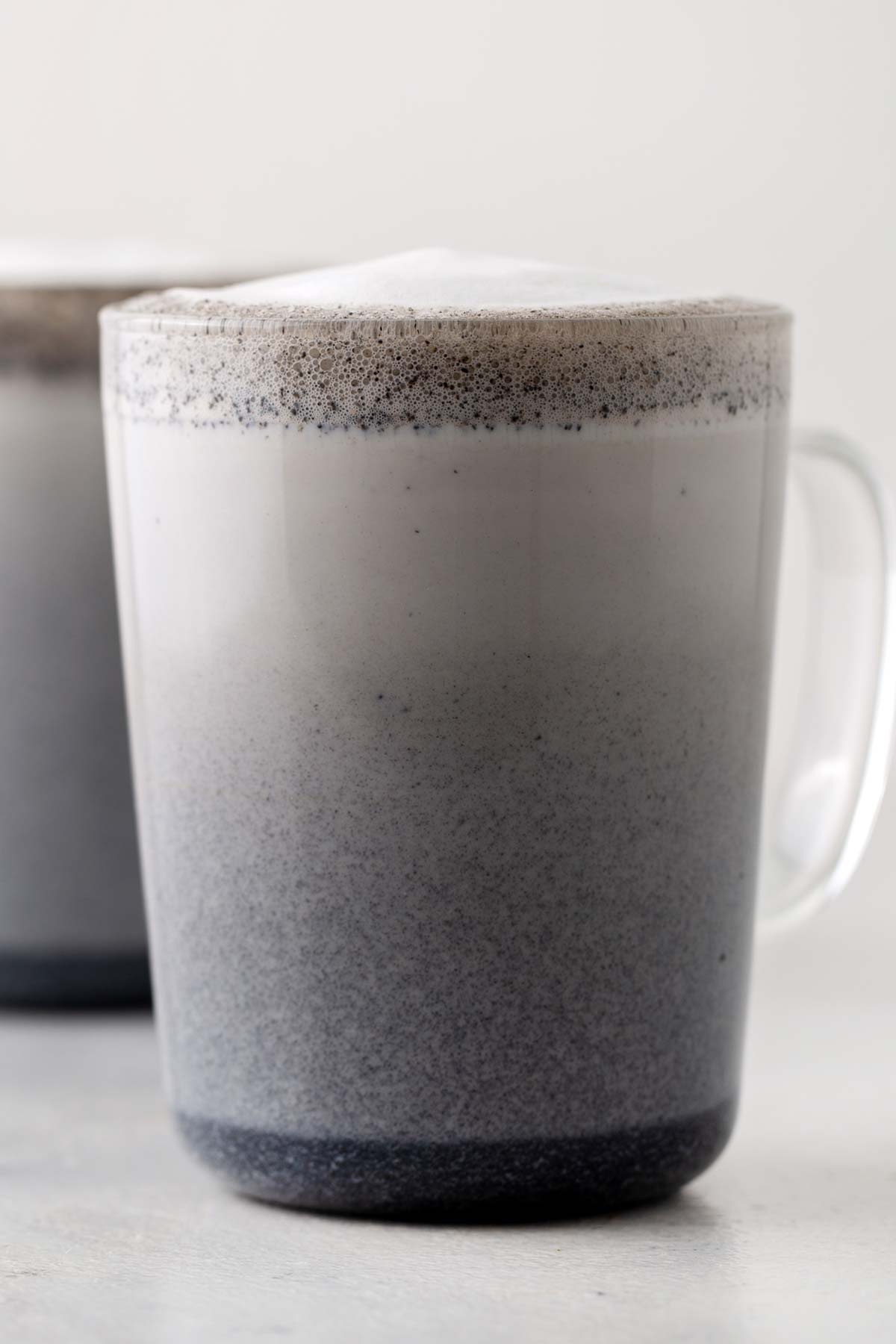 Black Sesame Latte in clear mug.