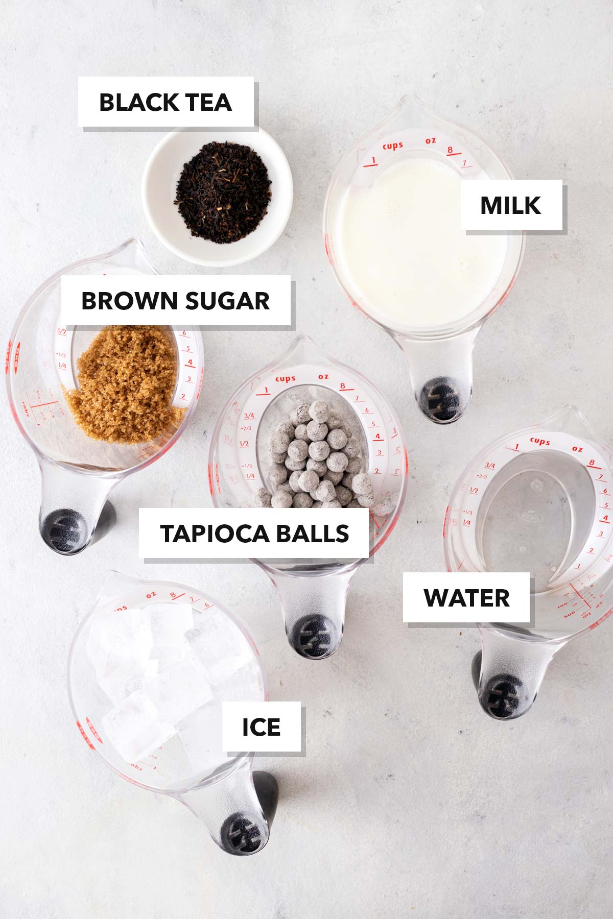 Brown Sugar Bubble Tea ingredients in measuring cups and bowls, labeled.