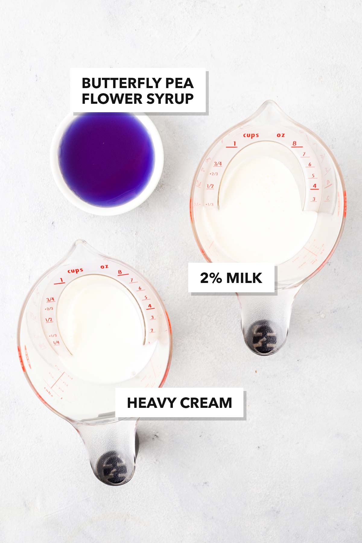 Butterfly Pea Flower Cold Foam ingredients in measuring cups and labeled.