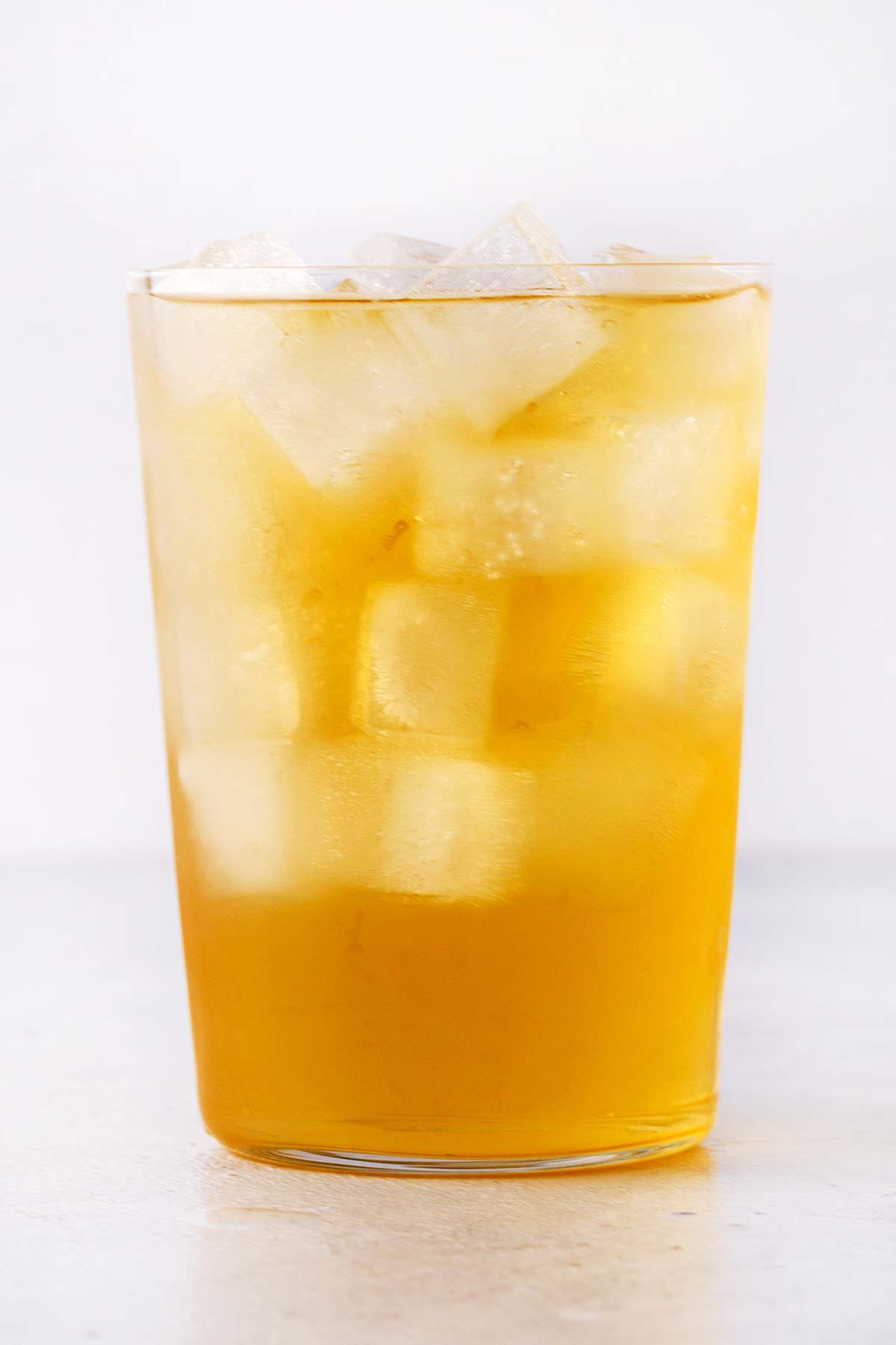 Chamomile Iced Tea in clear glass.