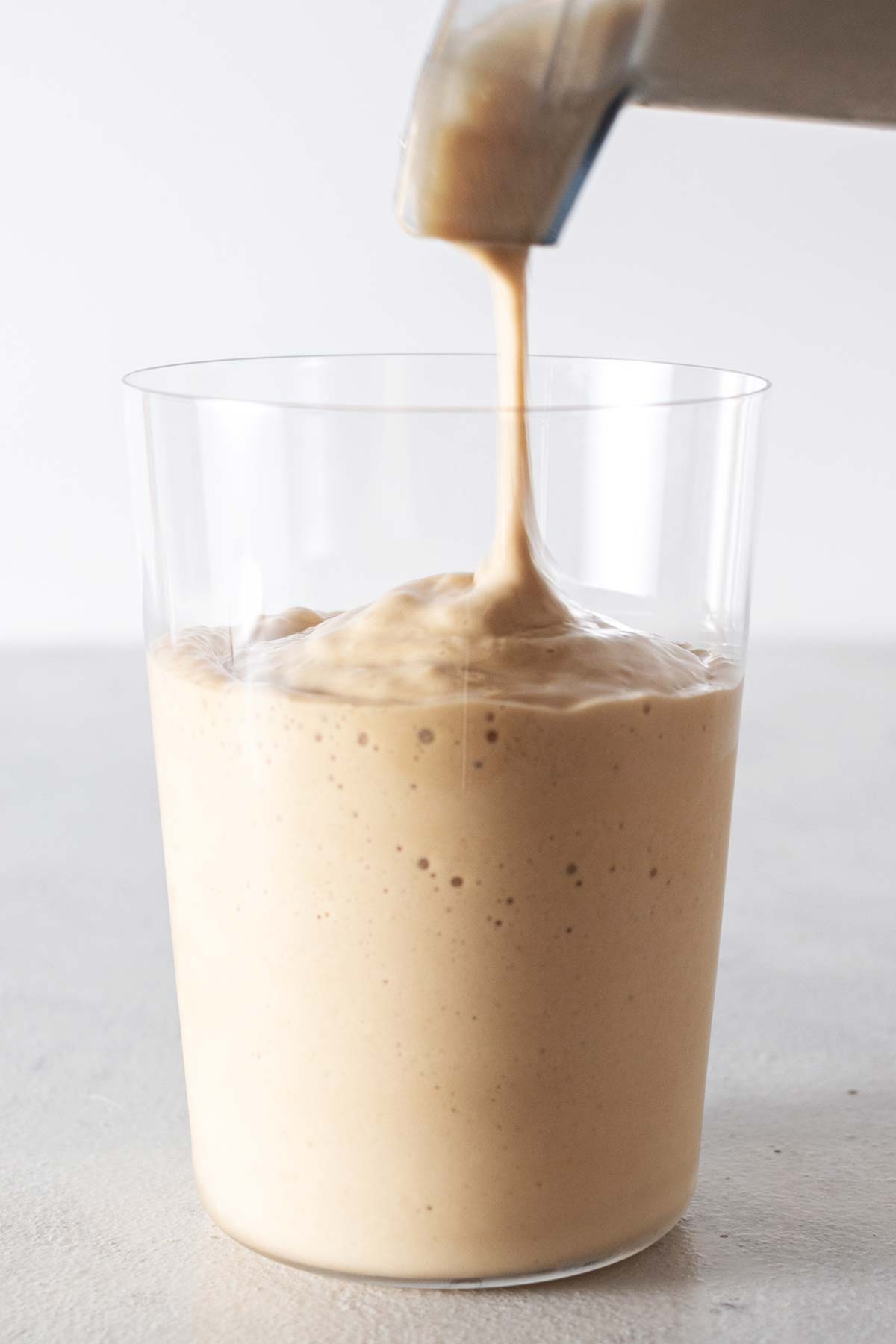 Frappuccino poured into a cup.