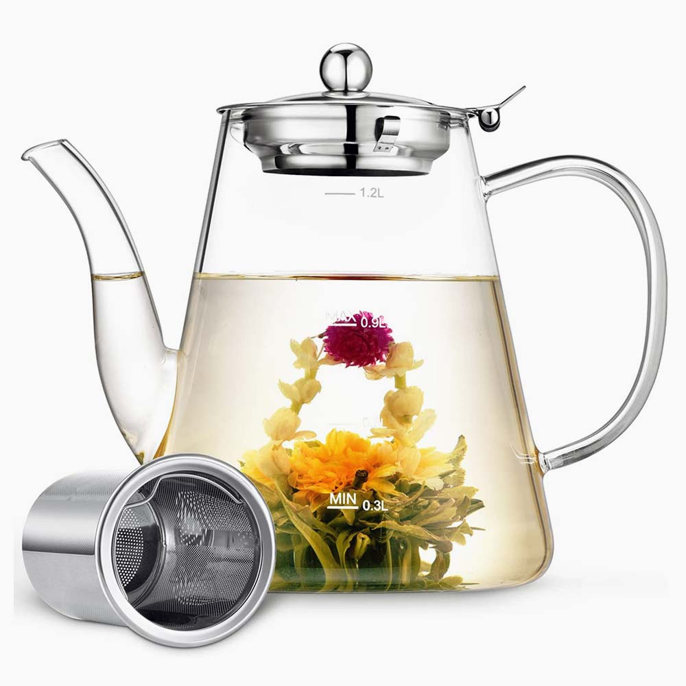 Glass teapot shaped like a tea kettle.