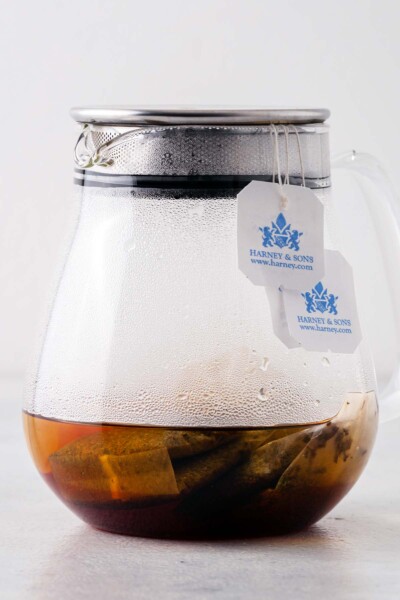 Steeping tea bags in a teapot. 