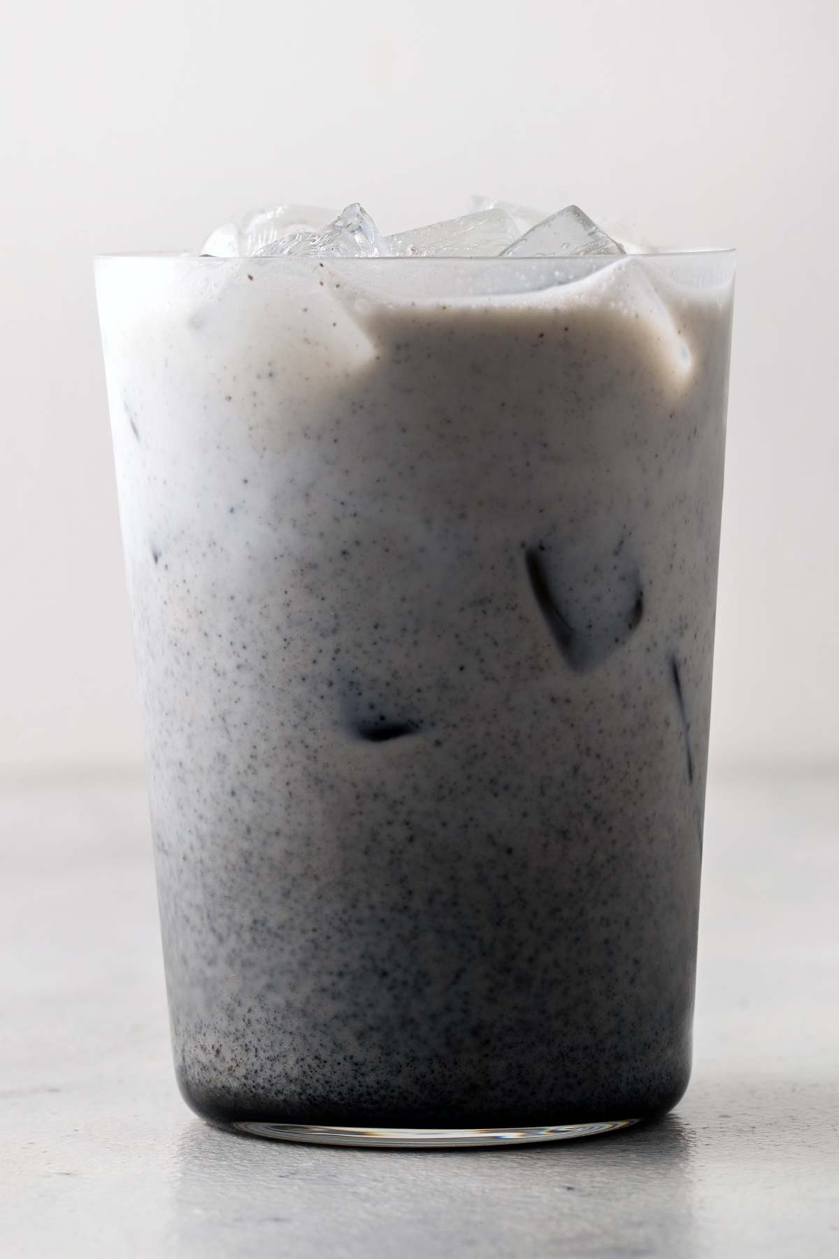 Iced Black Sesame Latte in clear glass.
