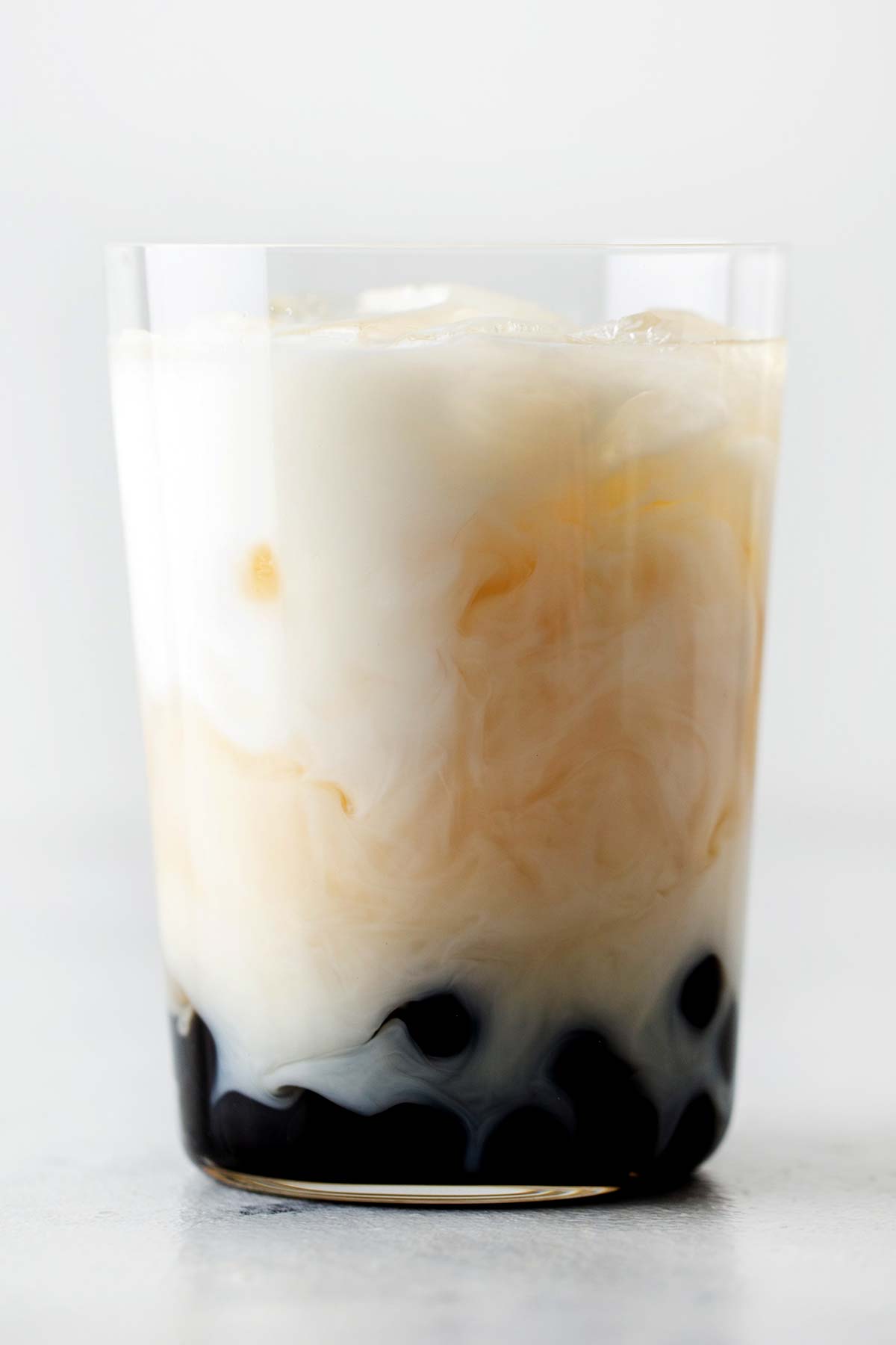 Jasmine Green Bubble Tea in a large clear glass.