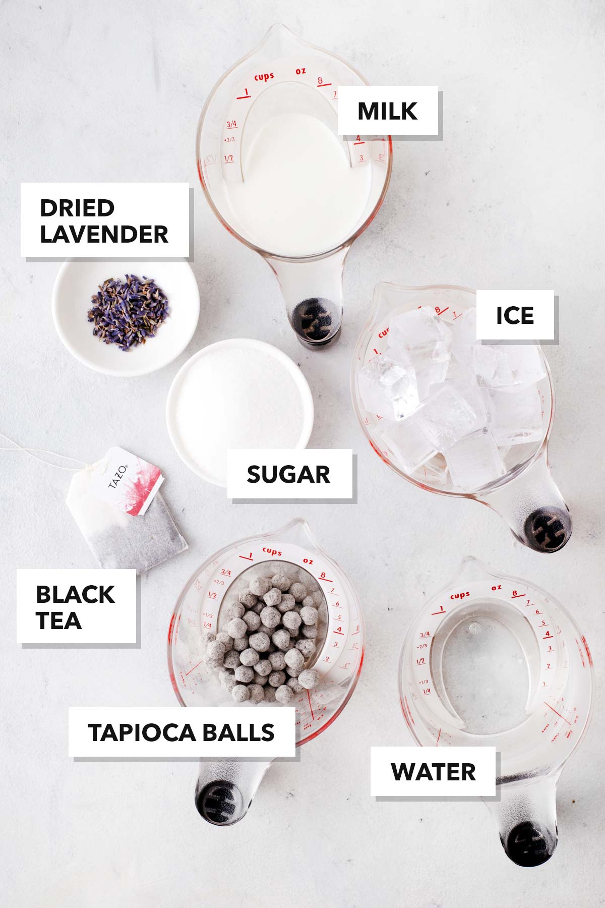 Lavender Bubble Tea  ingredients measured in cups and labeled on a table.