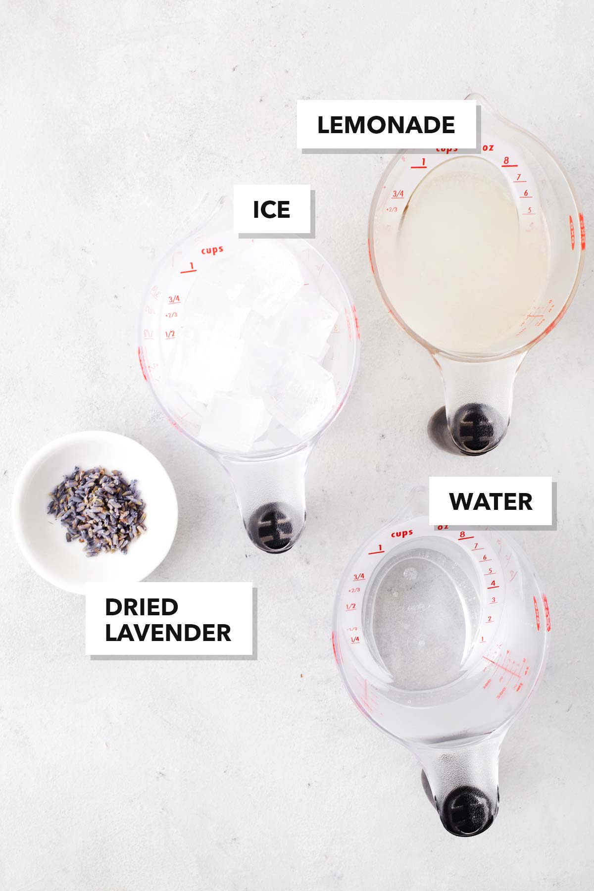 Lavender Lemonade ingredients measured out in bowls and cups.