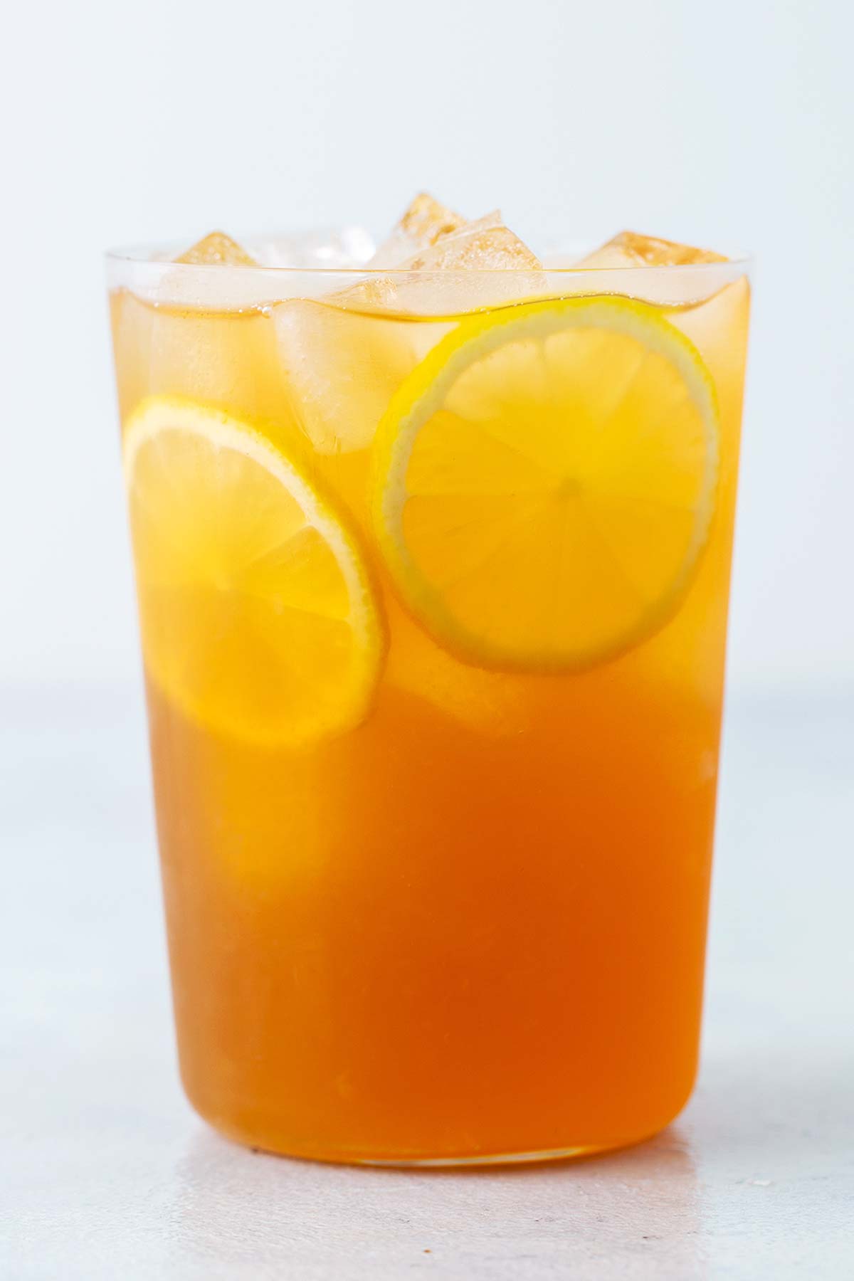Lemon Iced Tea in clear glass.