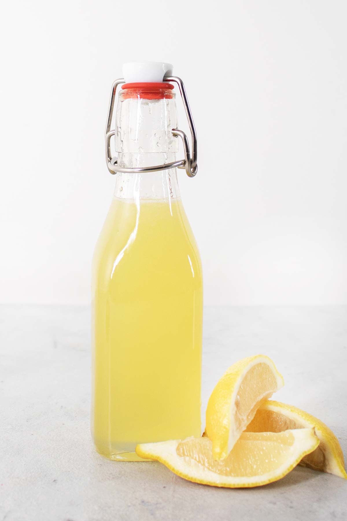 Lemon syrup in a glass bottle.