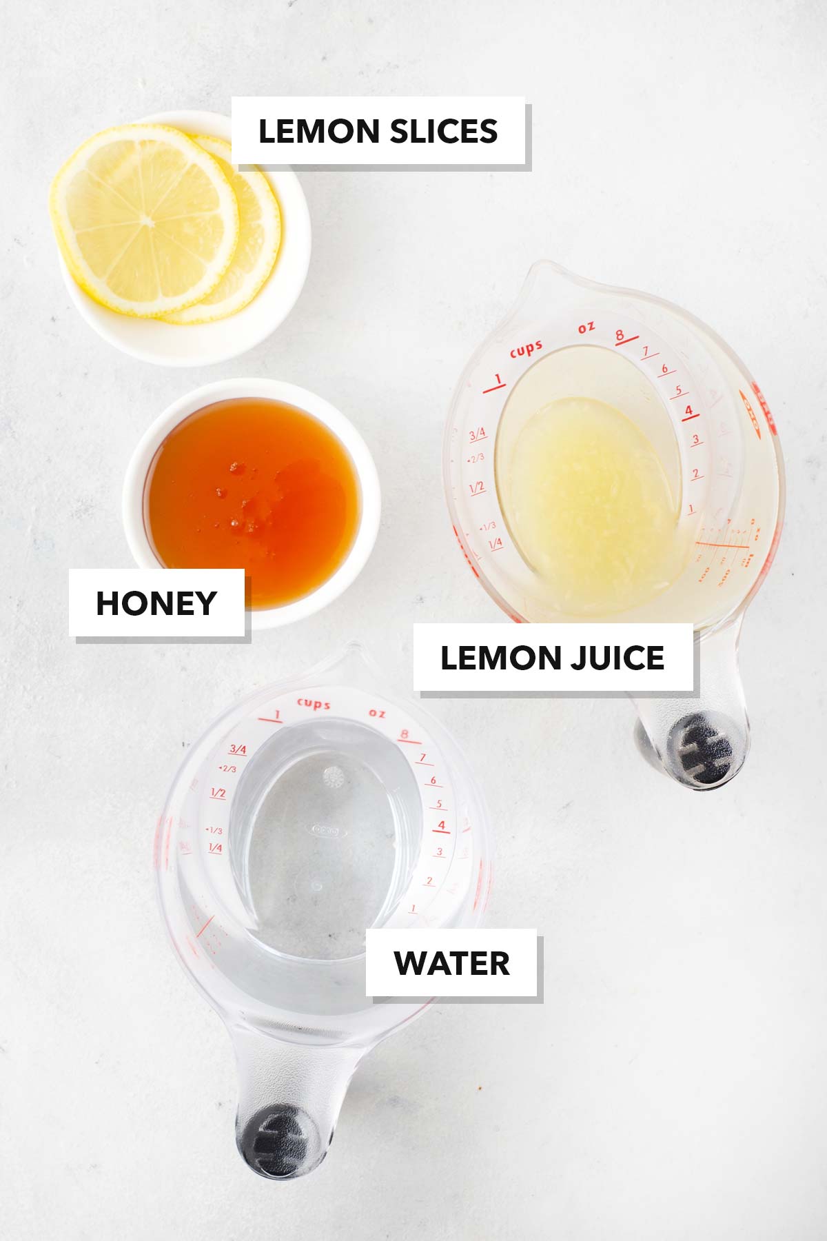 Lemon Tea ingredients measured in cups and labeled on a table.