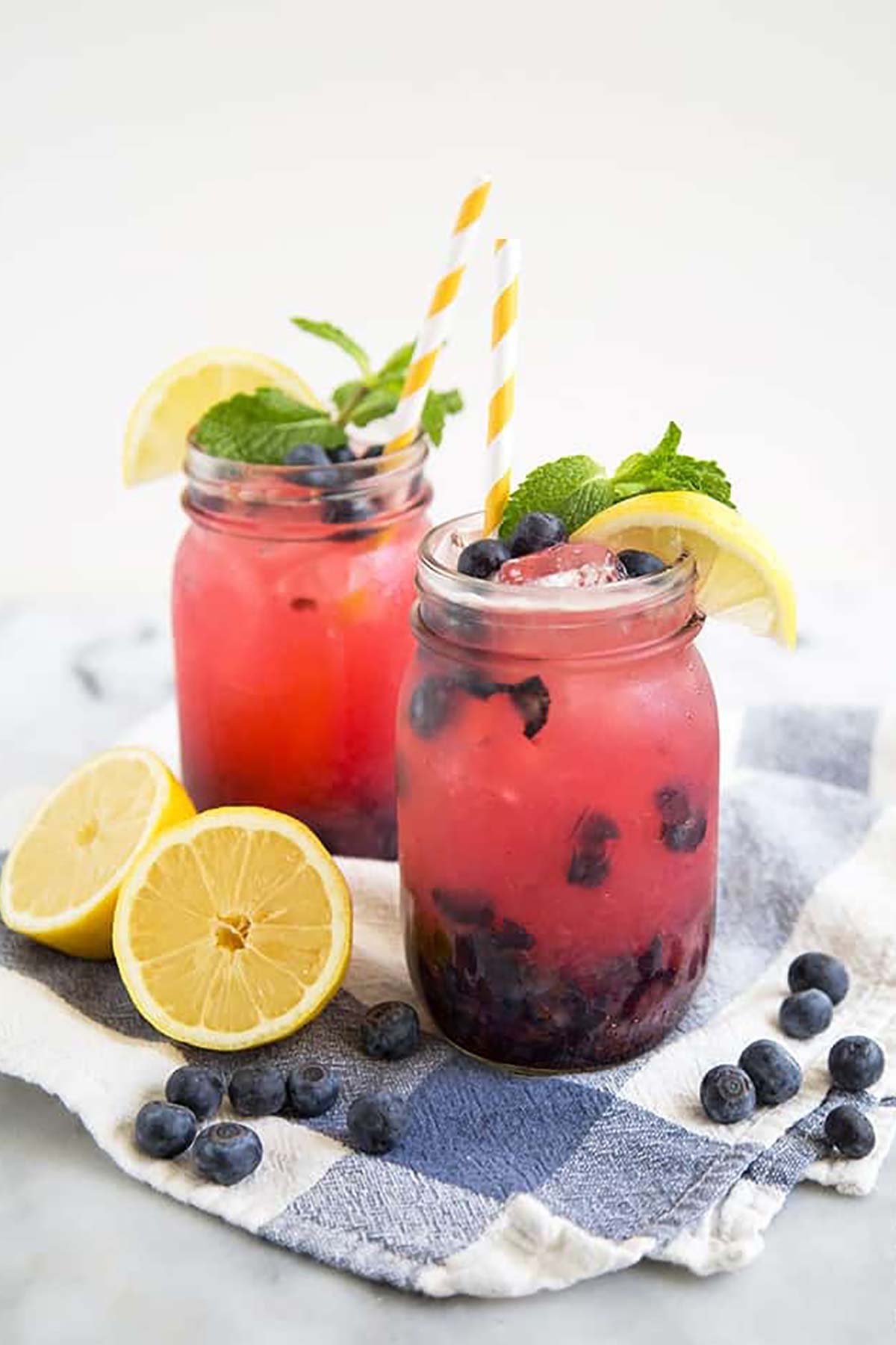 Sparkling Blueberry Lemonade in cups.
