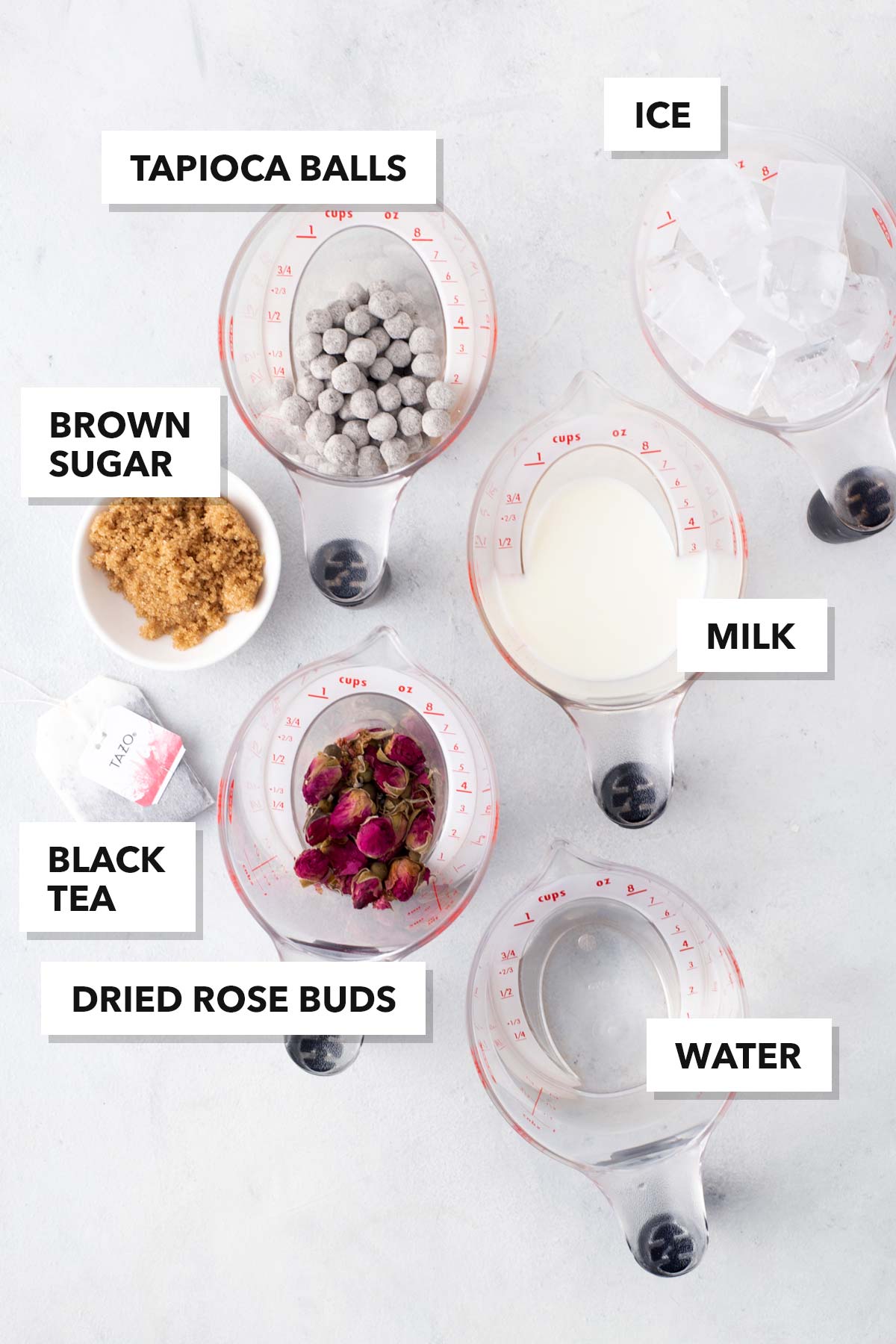 Rose Bubble Tea (Rose Milk Tea with Boba) ingredients in labeled measuring cups and bowls.