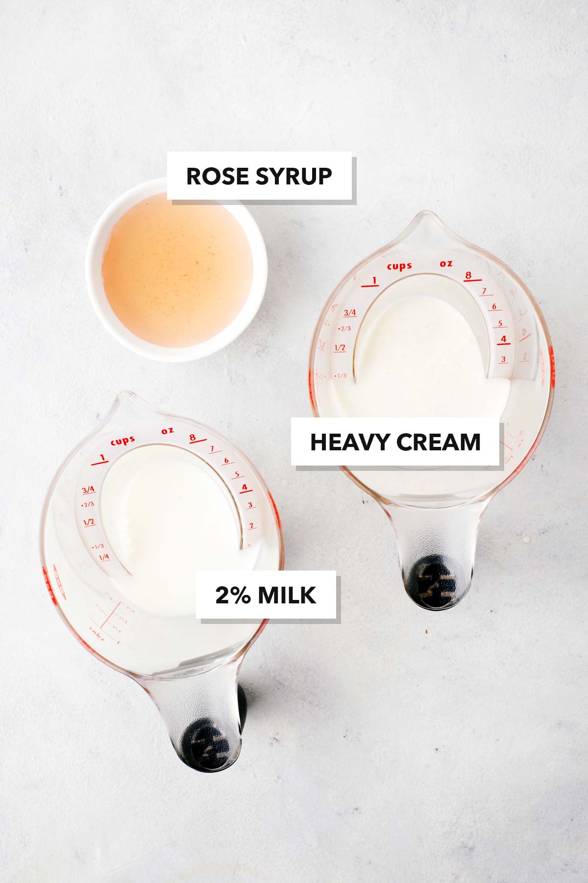 Rose Cold Foam ingredients in measuring cups and labeled.