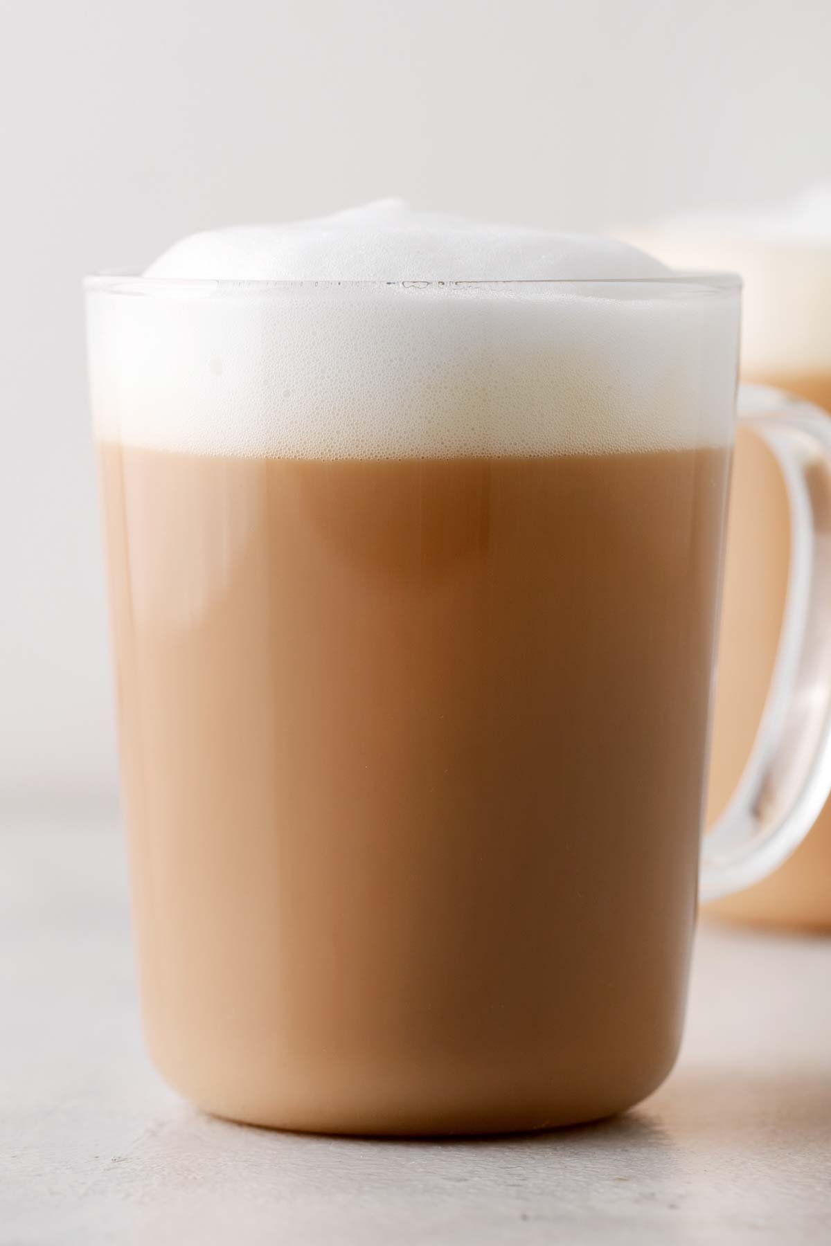 Starbucks Royal English Breakfast Tea Latte Copycat finished drink, in a clear mug with milk foam on top.
