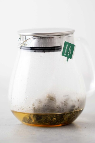 Tea bags steeping in a teapot. 