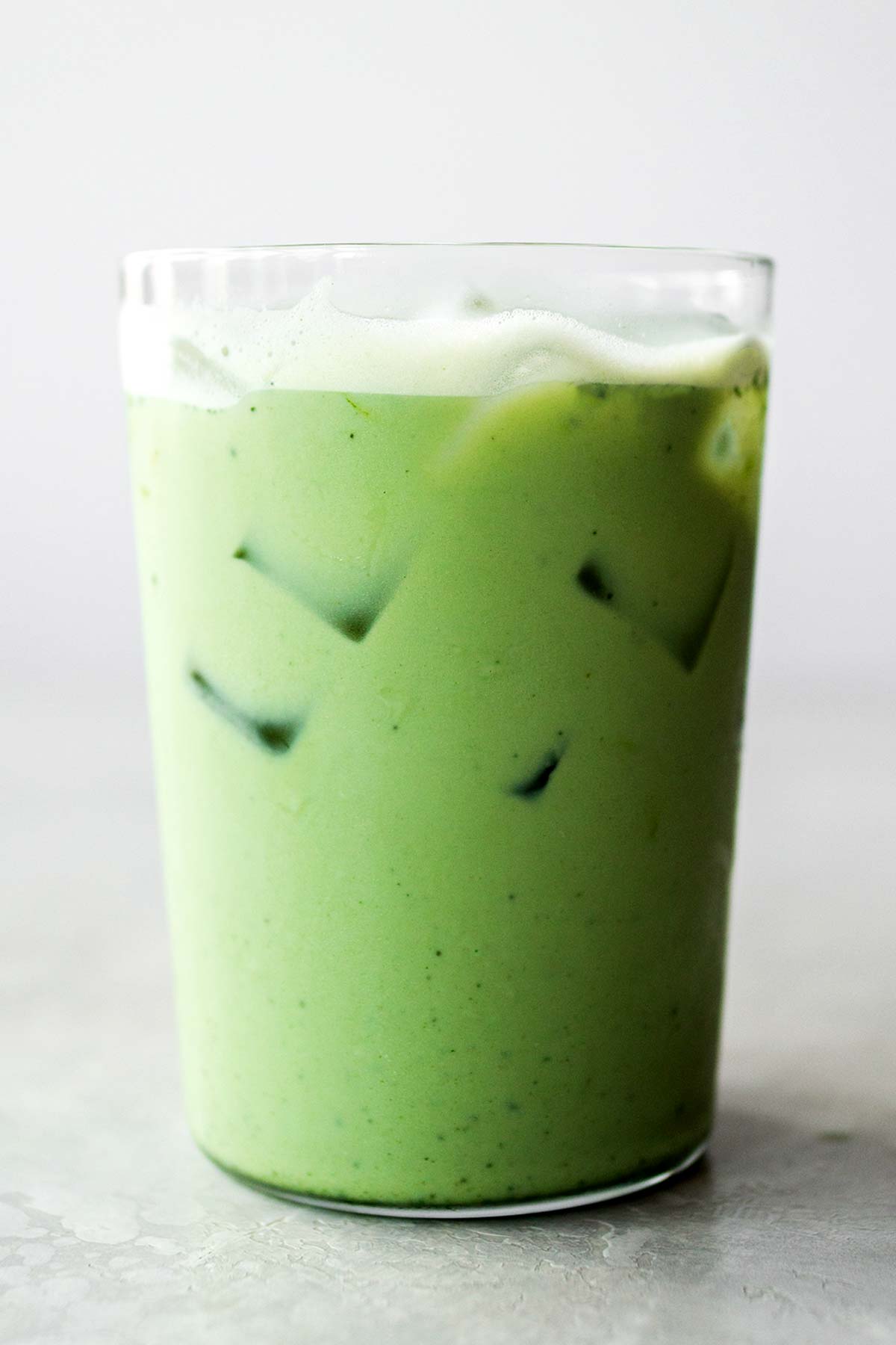 Iced Matcha Latte in a glass cup.