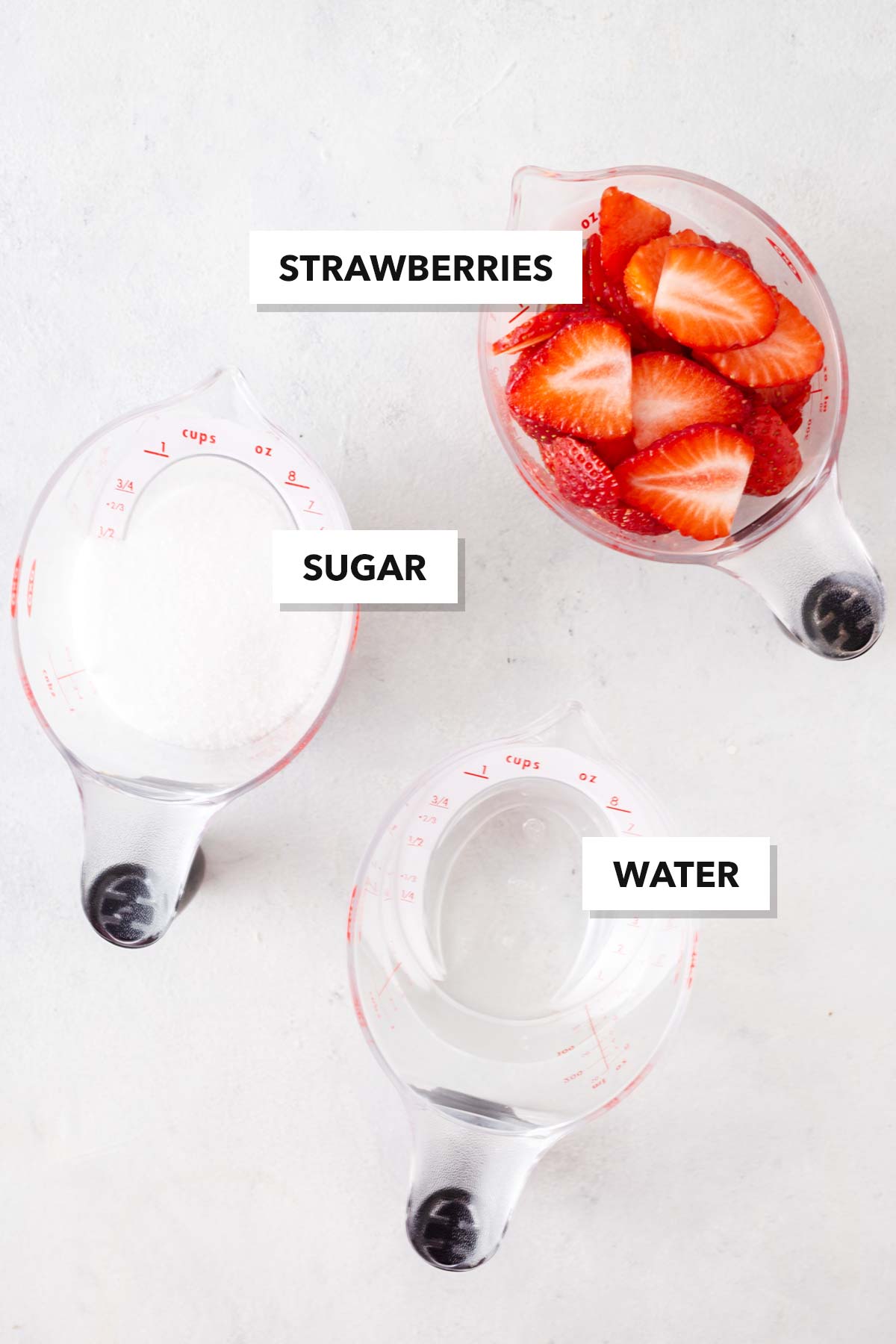 Ingredients to make strawberry syrup.