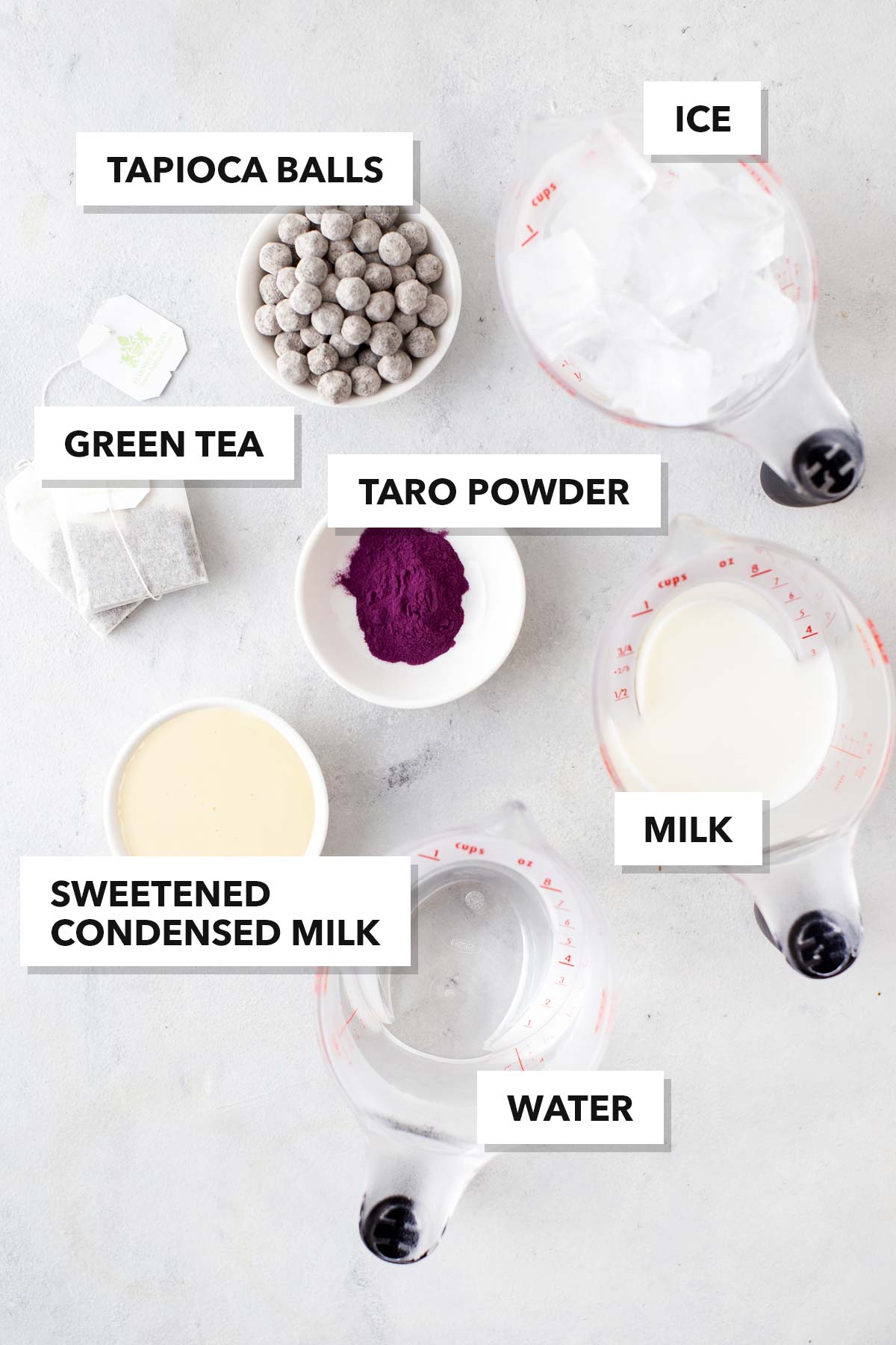 Easy Taro Milk Bubble Tea ingredients in measuring bowls and cups.