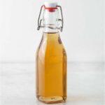 Vanilla simple syrup in a glass bottle.